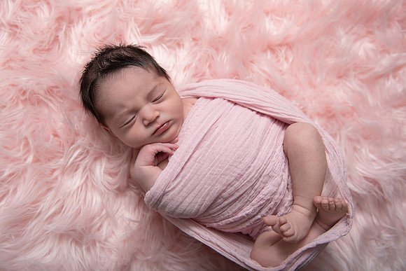 Newborn Girl in Studio